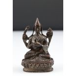 Bronze sculpture of a seated deity, height approx. 8cm