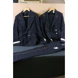 Two mid 20th century Bus company uniform to include jackets and trousers with yellow trim.