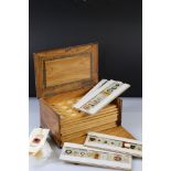Olive wood coin collectors cabinet, together with a selection of vintage scientific slides
