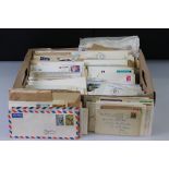 A collection of mainly British loose first day covers, used postcards and letter envelopes with