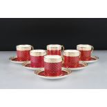 Set of Six Shelley Coffee Cans and Saucers decorated in burgundy with gilt stars