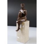 Moira Purver, Meditating on Purbeck, a limited edition cast resin sculpture, bronze patina, raised