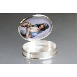 Silver oval shaped lidded box, with nude female enamel image