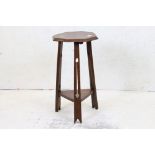 Art Nouveau Oak Side Table in the manner of Liberty of London with octagonal top and raised on three