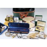 A collection of vintage and contemporary costume jewellery to include gold and silver examples.