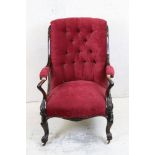 Victorian Salon Chair with carved walnut show-frame and red fabric button back upholstery raised