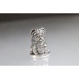 Silver thimble with embossed dog decoration