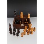 A mid 20th century carved wooden chess set in original fitted box.
