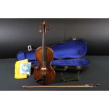 A vintage violin and bow complete with fitted case.