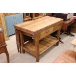 Substantial pine kitchen work table with single drawer and undershelf