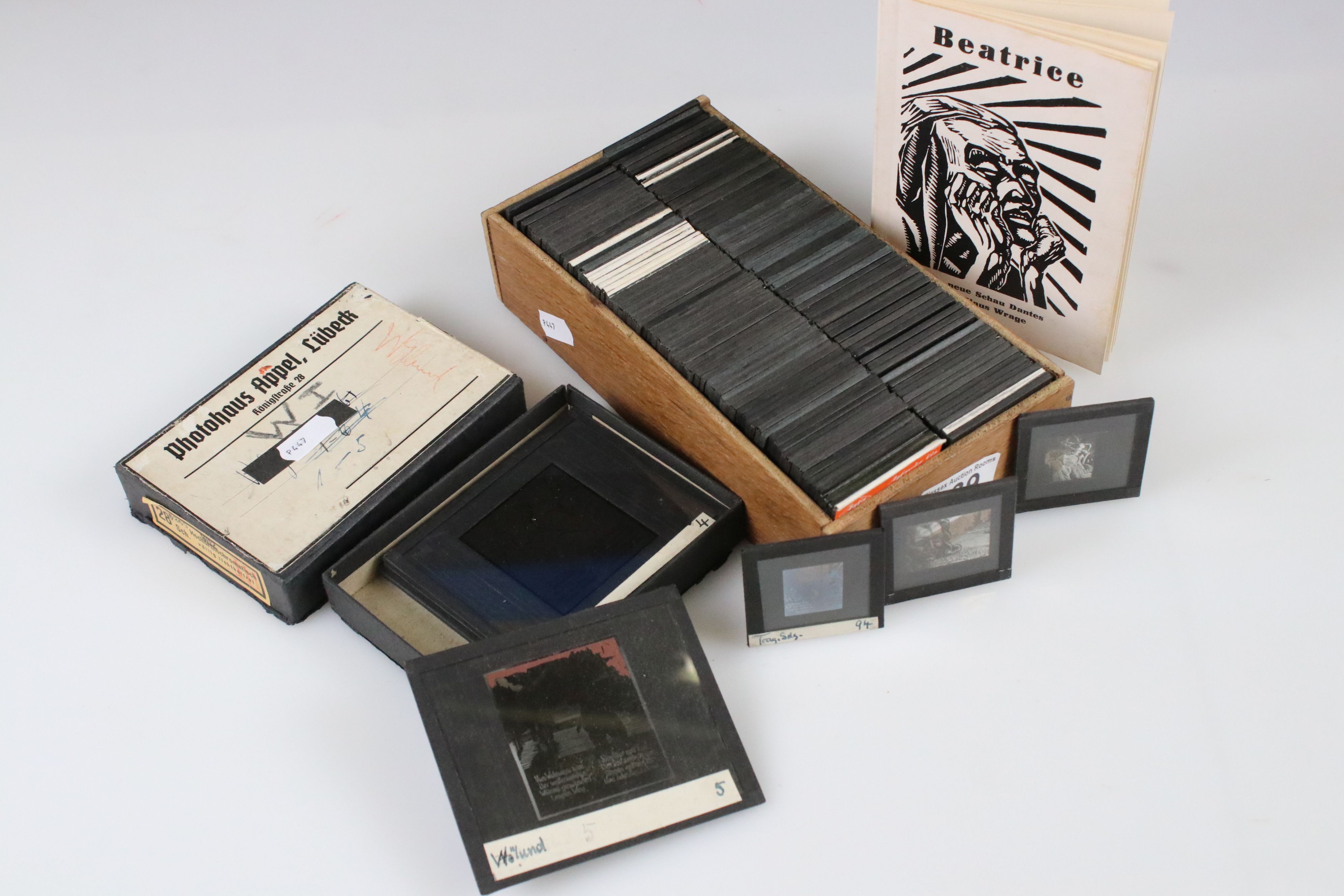 A collection of German magic lantern slides to include accompanying story book.