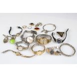A small collection of mixed watches together with a small quantity of costume jewellery.