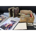 A box of mixed ephemera to include ordnance survey maps, vintage books and photographs within an