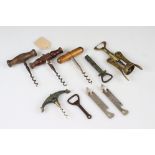 A small collection of corkscrews and bottle openers.