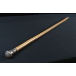 Late 19th / Early 20th century Walking Stick, the Chinese White Metal Handle with embossed