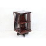 Edwardian Mahogany Square Revolving Bookcase raised on castors, 47cm wide x 88cm high