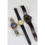 A small collection of three gents watches to include Sekonda, Rotary and Fossil examples.