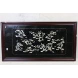 Chinese Lacquered Wall Hanging Panel with mother of pearl effect inlay depicting dragons, 122cm x