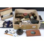 A box of mixed collectables to include pocket watch, telescope, railway token, boxes...etc..