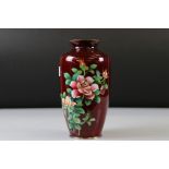 Japanese Ando Jubei style Ginbari Cloisonne Vase decorated with roses on a red ground, 25cm high