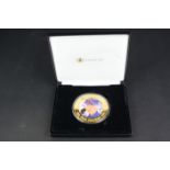 A sterling silver 'The Life and Times of Her Majesty the Queen' gold plated 5oz proof 65mm £5 coin