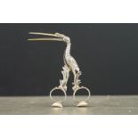 Pair of Victorian silver ribbon puller stork scissors, with a serpent wrapped around its neck and