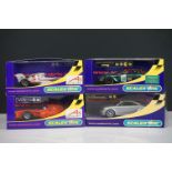 Four cased / boxed Scalextric slot cars to include C2708 A1 Grand Prix Team Netherlands, C2709 A1
