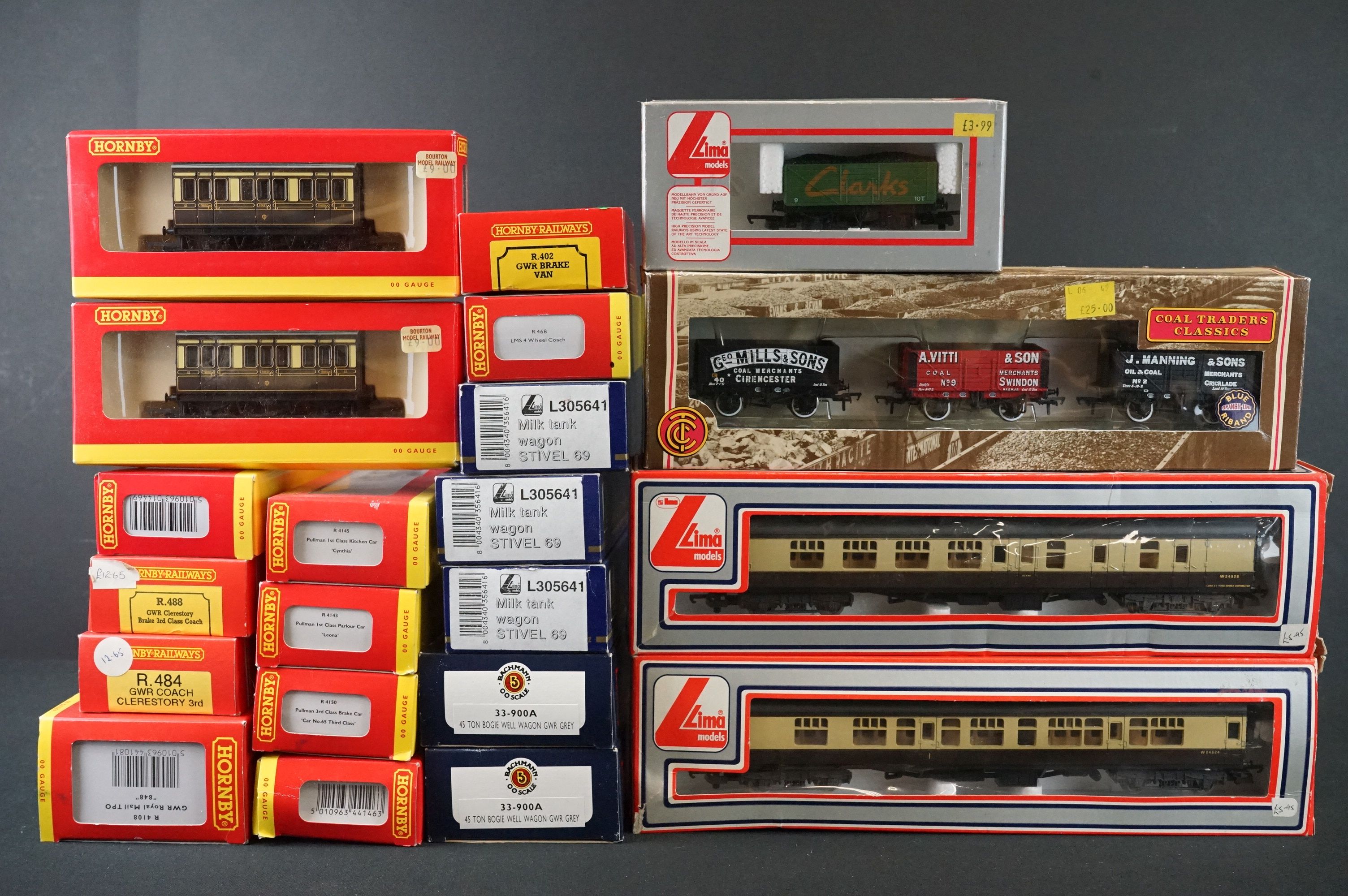 21 Boxed OO gauge items of rolling stock to include 12 x Hornby (features R4108 GWR Royal Mail TPO