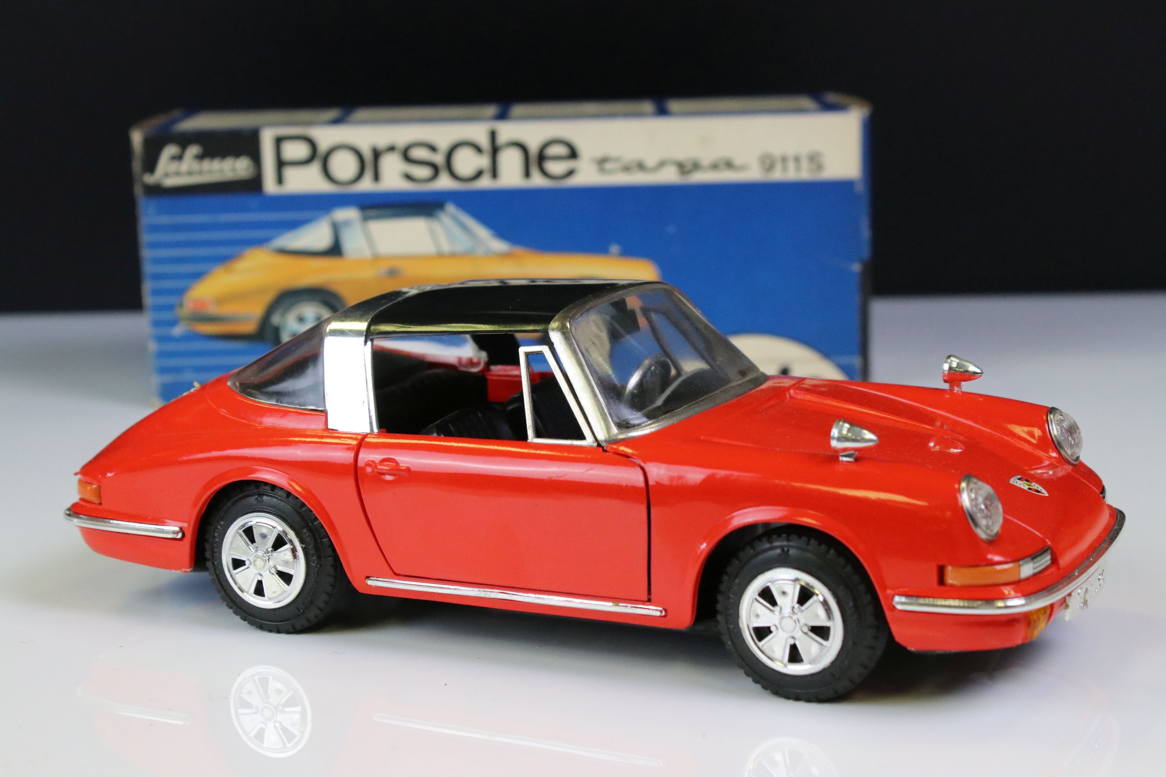 Boxed Schuco clockwork Porsche Targa 911S in red with black roof, vg condition with only minor paint - Bild 3 aus 8