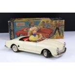 Original boxed Schuco 5735 Texi tin plate model in cream, female driver, with instructions and