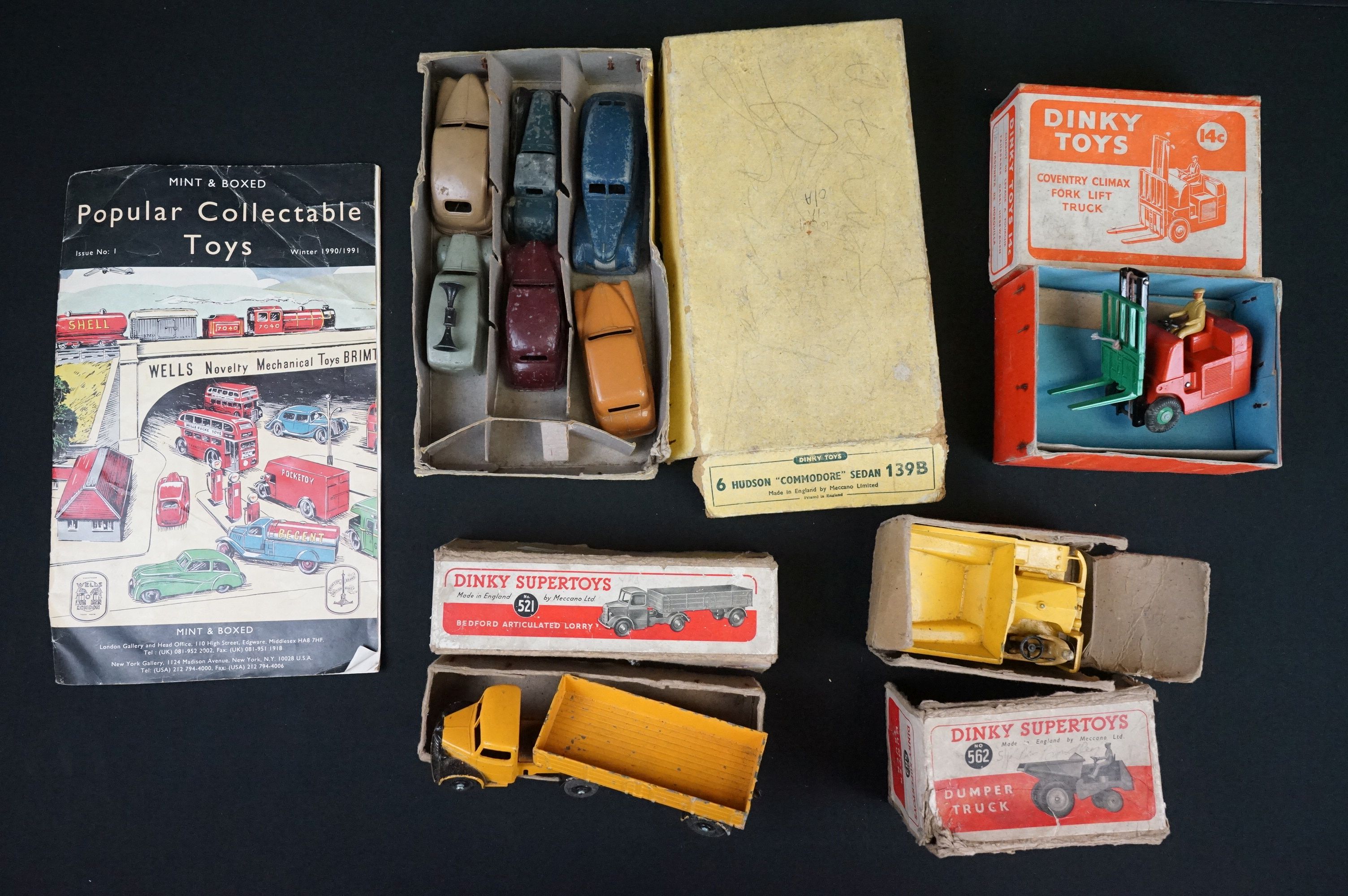 Three boxed Dinky diecast models to include 562 Dumper Truck in yellow, 521 Bedford Articulated