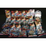 Over 20 carded diecast models to include Hot Wheels Speed Racer and Disney Wild Racer models