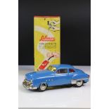 Boxed Schuco 5301 Fernlenkauto Ingenico tin plate clockwork car in blue, chassis loose from body,