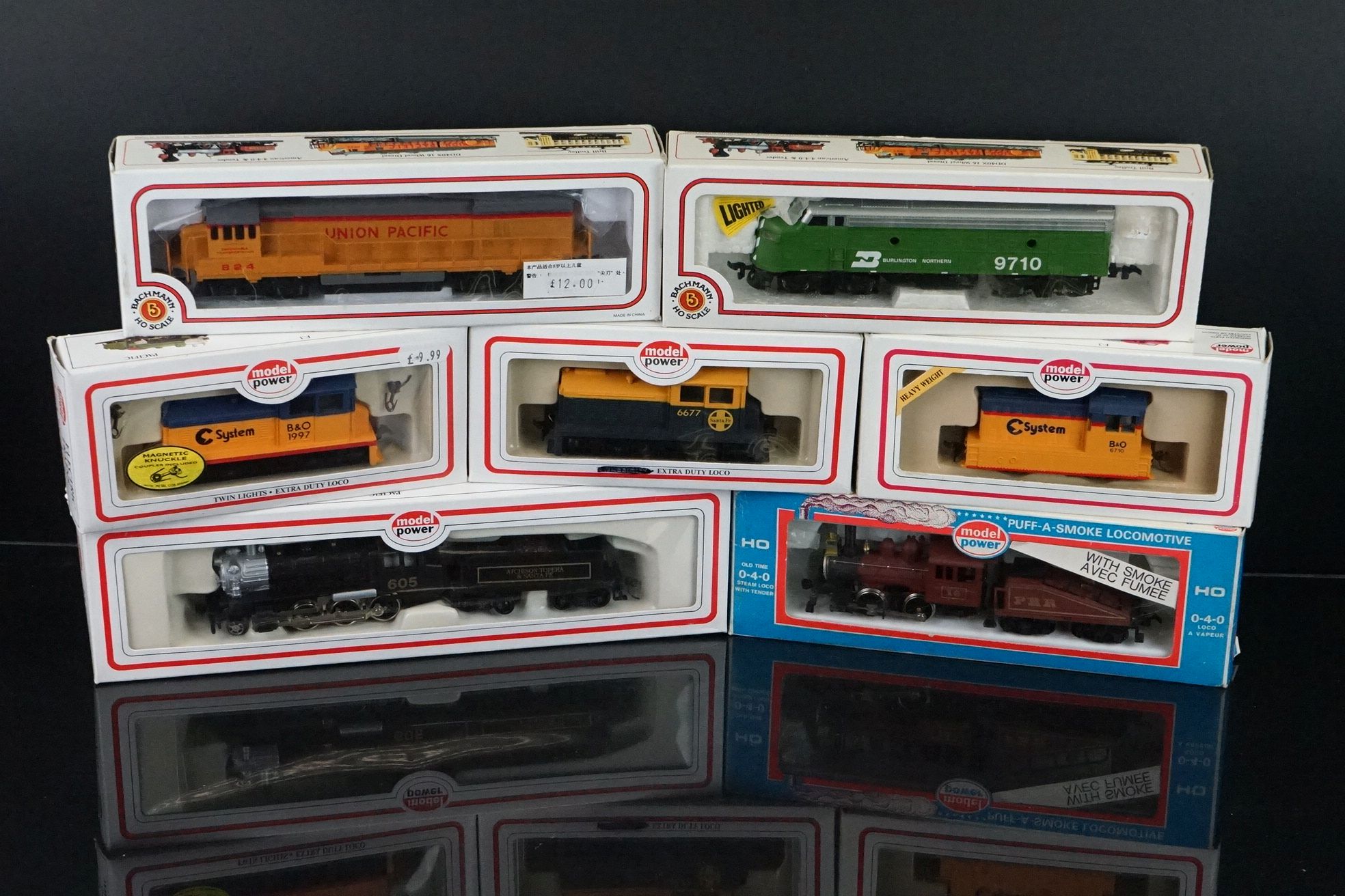Seven Model Power HO gauge locomotives to include Santa Fe, PRR, B&O, Union Pacific and Burlington