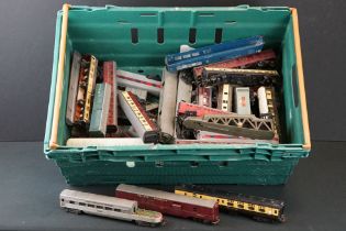 Over 55 OO gauge items of rolling stock to include various coaches, transporter, tankers and wagons,