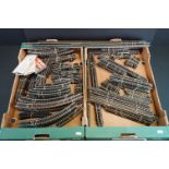 Quantity of OO gauge model railway track featuring various straights and curves, separated into sets