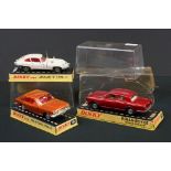 Three Cased Dinky diecast models to include 131 Jaguar 'E' Type in white, 164 Mk 4 Ford Zodiac in