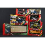 Seven boxed Britains farming diecast models to include 9321 Ford TW 35 Tractor, 9527 Fiat Half Track