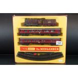 Boxed and sealed Triang Hornby OO gauge The Midlander train set, some seal splits but ex overall, no