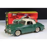 Original boxed Schuco Elektro Razzia Car 5509 tin plate model in evergreen with cream hood, with