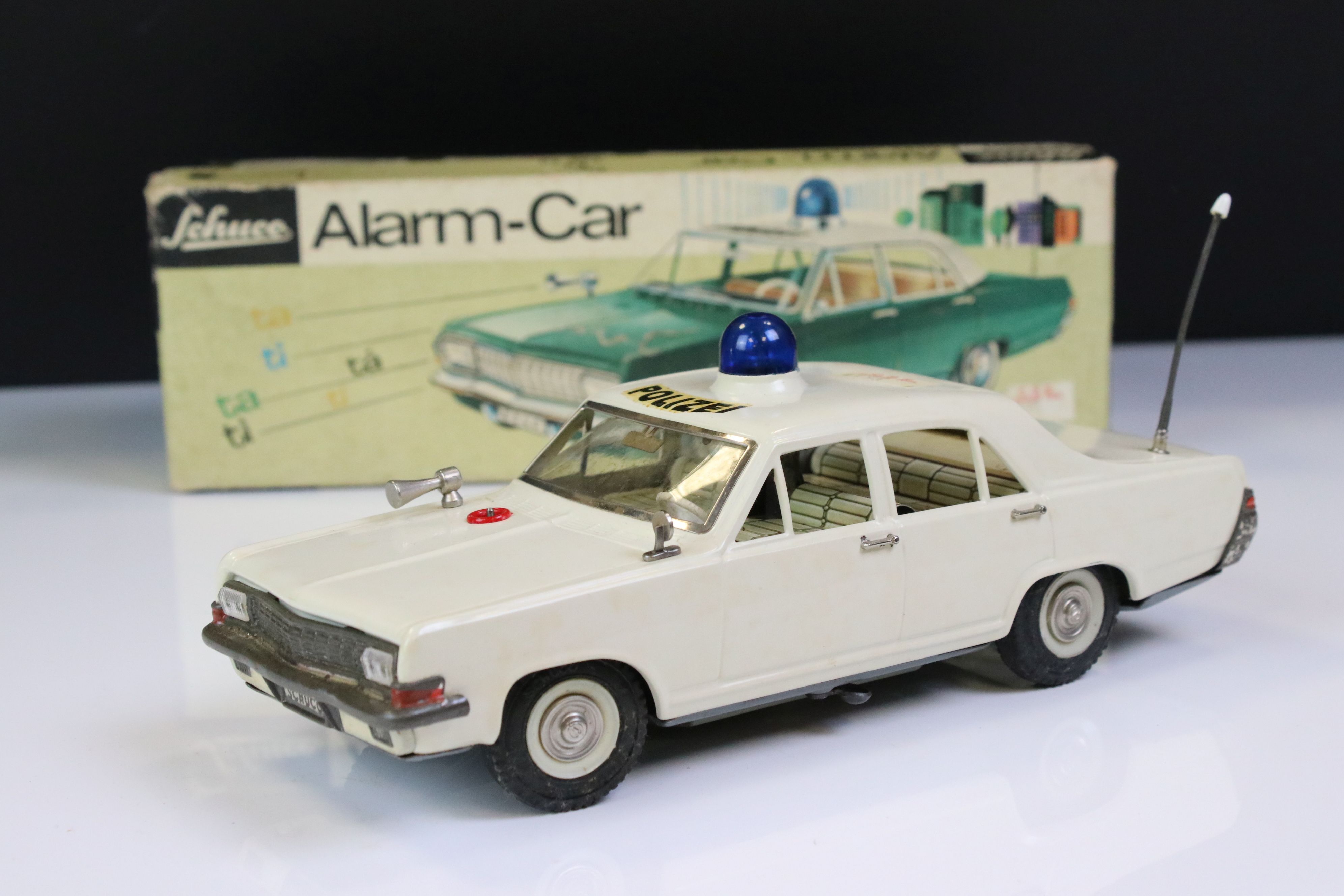 Boxed Schuco Alarm-Car 5340 Opel Admiral tin plate Police car in white, with aerial, blue light