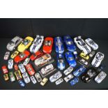 Over 40 diecast models featuring various scales to include Maisto, Burago etc