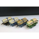 Four Hornby O gauge Nestle Milk Tank Wagon to include green bed version, black bed version and 2 x