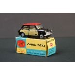 Boxed Corgi 249 Mini Cooper with de-luxe wickerwork diecast model with black body, red roof and pale