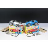 Two boxed Schuco Grand Prix Racer clockwork tin plate models to include 1071 in silver and 1070 in