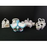 Group of pottery egg stand and egg cup holders