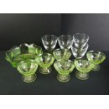 Set of Six Uranium Green Glass Sundae Dishes and a Fruit Bowl together with Set of Four Glasses with