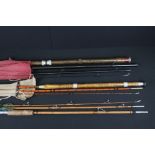 A small collection of vintage fishing rods to include split cane examples.