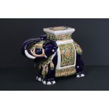 A large ceramic elephant seat / stool, stands approx 41cm in height.