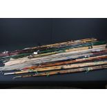 Collection of 20 split cane, bamboo & fibreglass sea & freshwater fishing rods, to include vintage